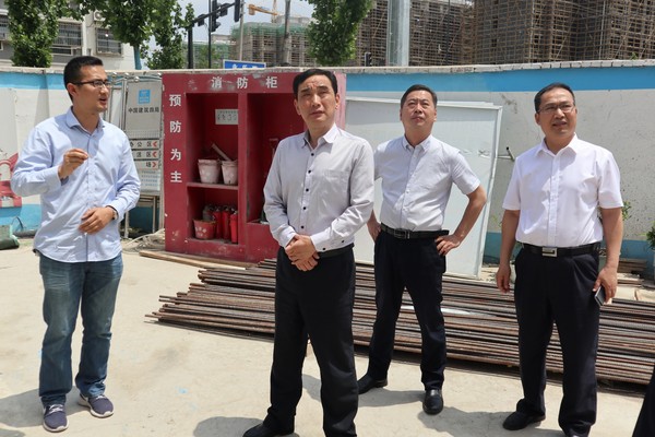 在留守司安置小区建设工程现场调研.JPG